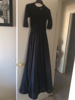Beautiful black long dress size small never use