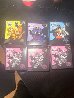 McDonald’s hello kitty x Godzilla toys 10 each