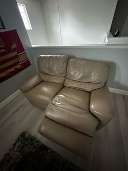 Leather power reclining love seat