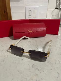 Cartier glasses dark shade