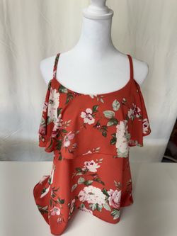 $6  Women Cold shoulder top with ruffled detailing.size L, $6