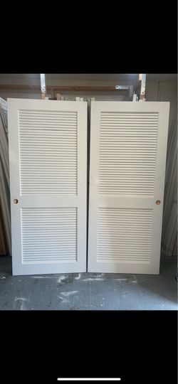 Louvre door 34x78” pantry door laundry door vented door  I have sold wood louver door. Door measuring 34x78” each $ 110 each door slab solid wood. I h