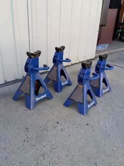 FOUR JACK STANDS.
