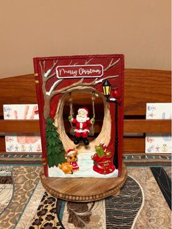 Book Swinging Santa