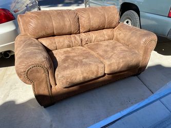 Soft leather tan/brown loveseat