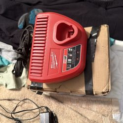 Milwaukee Charger ,battery And Impact 