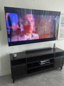 Samsung Smart TV With Entertainment Center And Sound Bar – Excellent Condition
