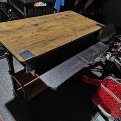 Portable narrow height-adjustable desk