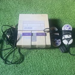 Super Nintendo ( With Cords And Controllers )
