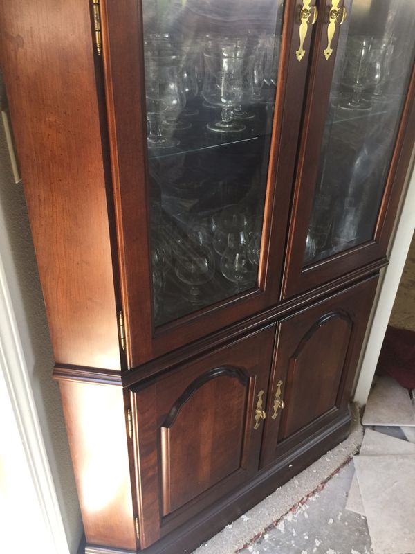 Hardwood Corner Curio Cabinet With Enclosed Base For In Hardwood Corner Curio Cabinet With Enclosed Base
