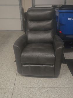 Slim Grey Faux Leather Swivel Rocker