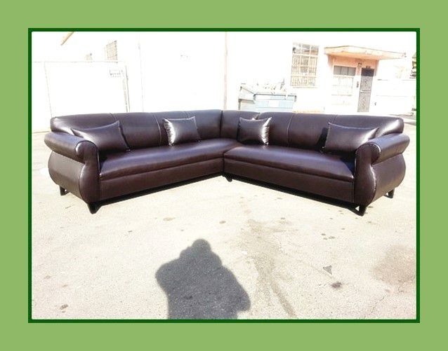 new 9x9 ft "Brown leather" sectional couches