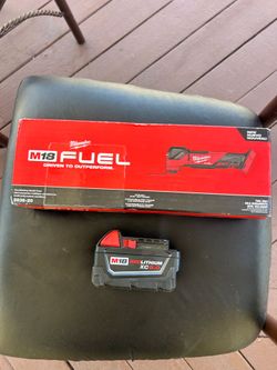 M18 FUEL 18V Lithium-Ion Cordless Brushless Oscillating Multi-Tool  and battery 5.0
