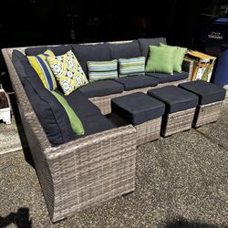 Cute Patio Couch with Footstools and Pillows 