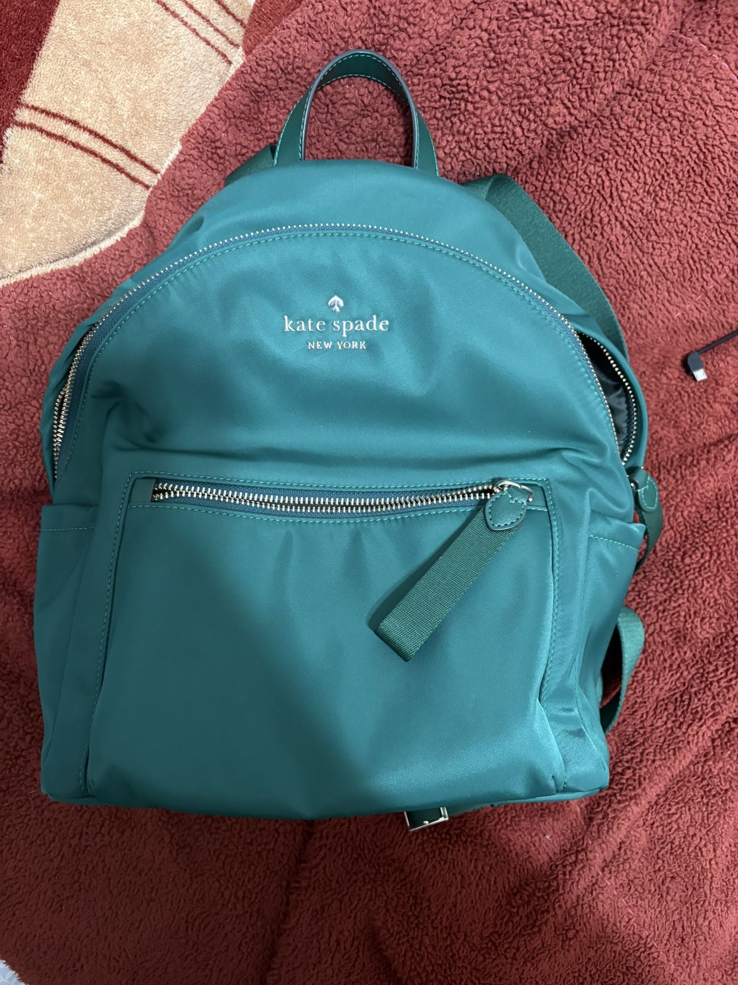 Green Kate Spade backpack, the Watson Lane Hartley