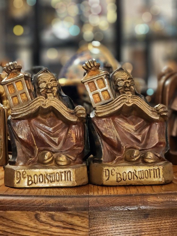 Antique Armor Bronze bookends, entitled "Ye Bookworm"