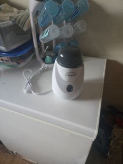 NEW Brown warmer bottle & free  used bottle