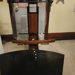 Tv Stand With Glass shelves  TO A Good Home