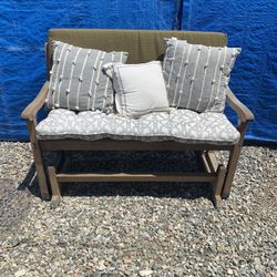 Teak rocking bench with cushions. Paid 500 for it 