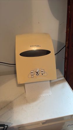 Paper towel dispenser. Paper towel dispenser