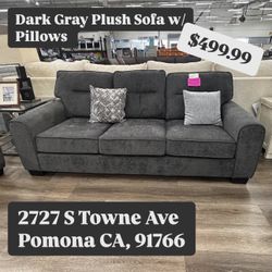 Dark Gray Plush Sofa With Pillows  