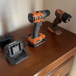 Brand new drill and flashlight