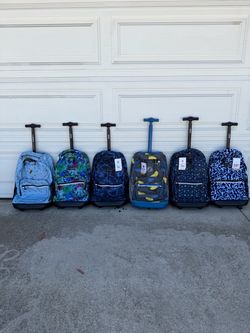 Boy rolling school bag new coming