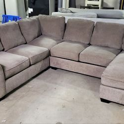 New Floor Model Brown Sectional Sofa