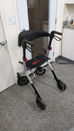 Walk mate adjustable height Walker with fold down seat. Does not include basket.
