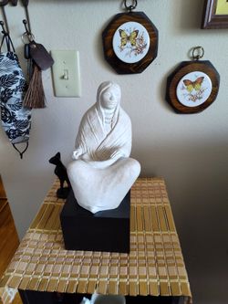 Concrete Indian Sitting On Black Base