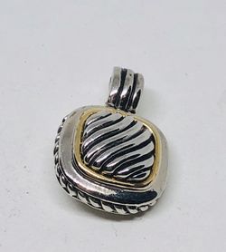 Pendant in silver and gold tones