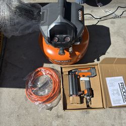 RIDGID 6 Gal. 150 PSI Portable Electric Oil-Free Jobsite Pancake Air Compressor with 25 ft. Air Hose and 18GA Brad Nailer