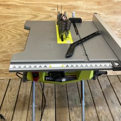 RYOBI 10IN TABLE SAW WITH STAND 