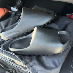 BRAND NEW!!! AUTHENTIC!!!! YEEZY SLIDES,  SIZE 11 in the BLACK ONYX