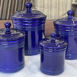 Set of fof 4 Club Design cobalt blue ceramic canisters  jars with ribbed bodies and solid lids.