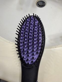 Straightening hair brush