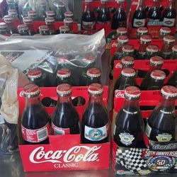 Coke bottles. LOT OF 247