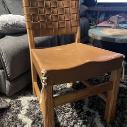 unique and hard to find Brandt Ranch Oak  leather /wooden hand made chair 🪑 very heavy very solidly built has off white leather tassels on the left a