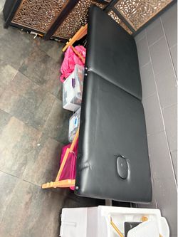Massage bed with cushion and cover to easily sanitize