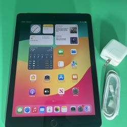 Apple iPad 6th Gen 128GB WiFi + Cellular unlocked 9.7” -Space Gray  