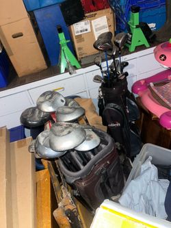 Two sets of golf clubs $15 ea