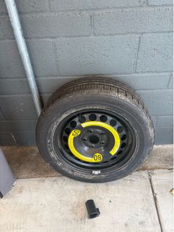 New Goodyear tire on a spare tire rim