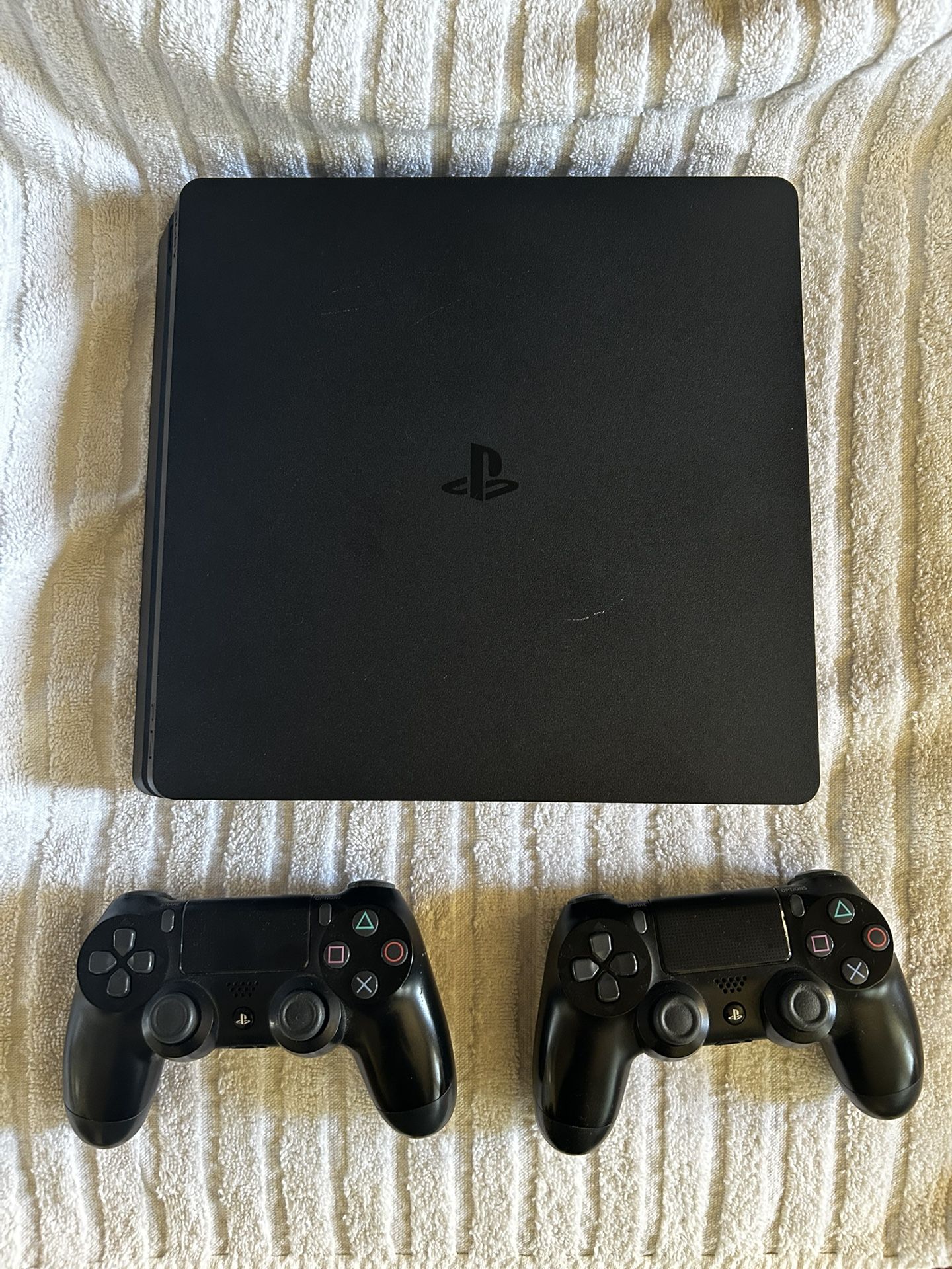 PS4 Slim w/ Two Controllers + Games