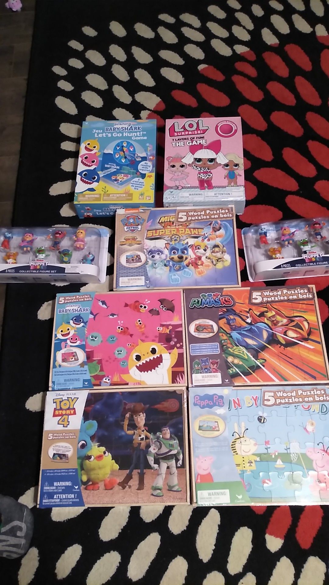 Muppet babies figures, wooden puzzles, and games