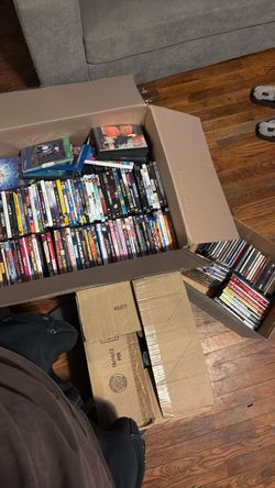 Large Lot of DVDs and CDs