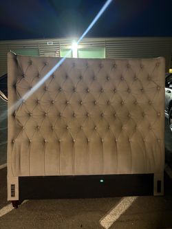 Grey tufted head board queen