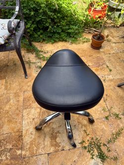 Black Faux Leather Rolling Saddle Stool