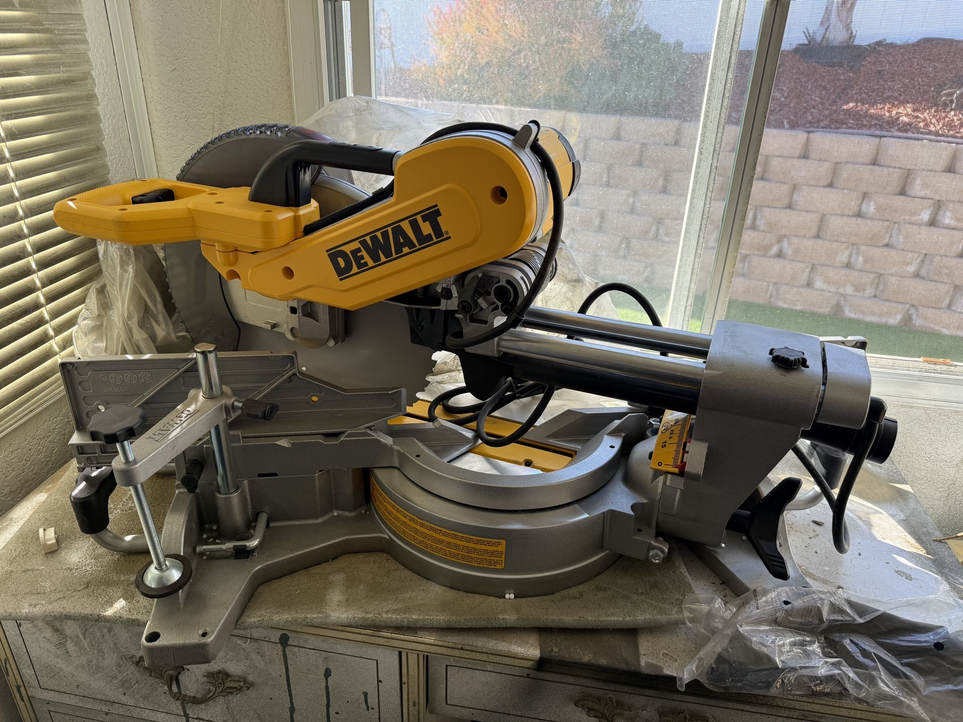 Never Used 15 Amp Corded 12 in. Double Bevel Sliding Compound Miter Saw, Blade Wrench and Material Clamp