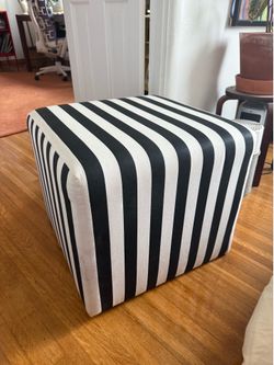 Black and white striped ottoman