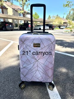 Brand new 21” Bebe carryon luggage